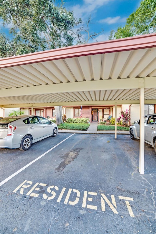 view of car parking featuring a carport