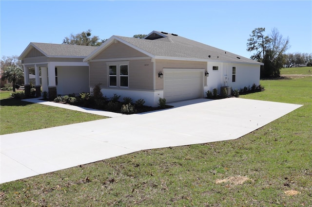 single story home with driveway, a garage, roof with shingles, central air condition unit, and a front lawn