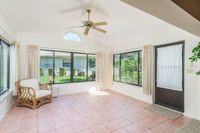 unfurnished sunroom featuring ceiling fan and lofted ceiling