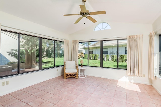 unfurnished sunroom featuring lofted ceiling and ceiling fan