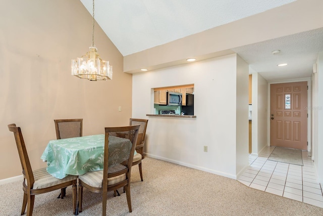 carpeted dining area with a chandelier, a textured ceiling, and vaulted ceiling