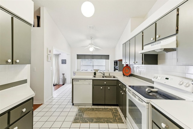 kitchen featuring gray cabinetry, white appliances, lofted ceiling, ceiling fan, and sink