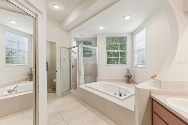 8088 Spanish Oak Dr, Spring Hill, FL 34606 - bathroom featuring healthy amount of natural light, a shower stall, vanity, toilet, and recessed lighting