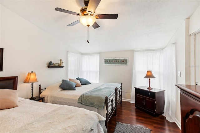 8088 Spanish Oak Dr, Spring Hill, FL 34606 - bedroom featuring dark wood-style flooring, ceiling fan, and baseboards