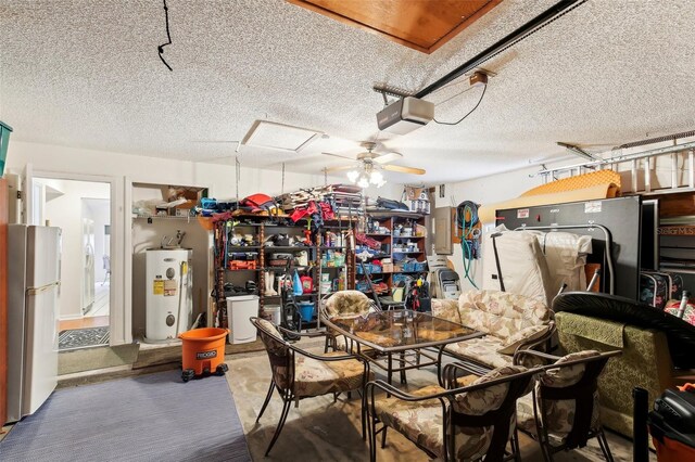 dining area with a textured ceiling, water heater, and ceiling fan