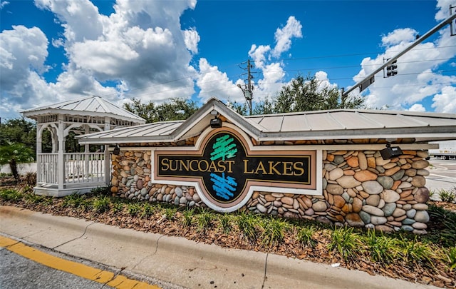 view of community sign