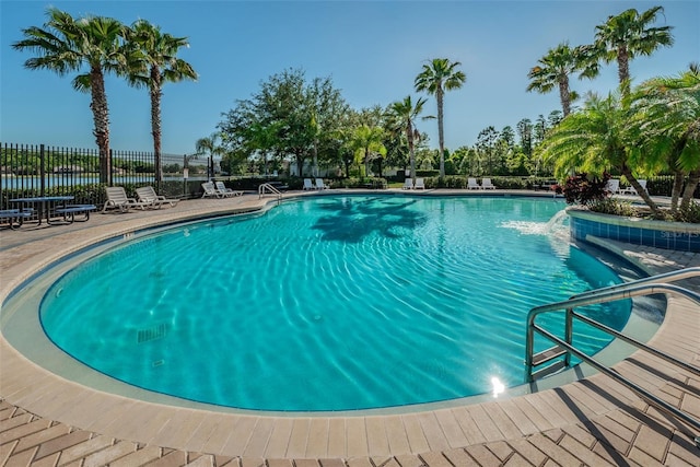 view of pool featuring a patio area and pool water feature