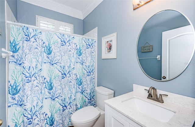 bathroom featuring vanity, toilet, crown molding, and curtained shower