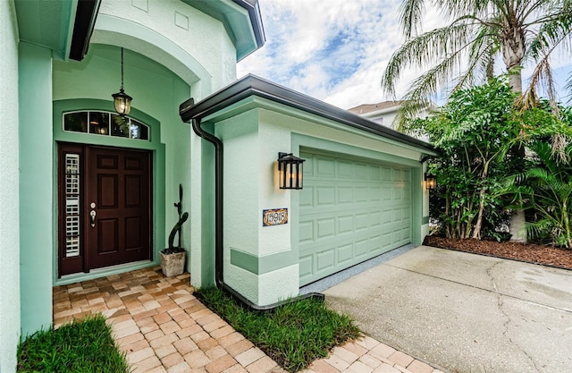 entrance to property featuring a garage