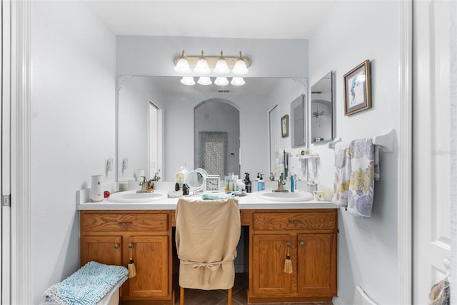 bathroom featuring tile patterned floors and vanity