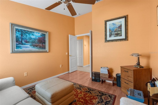 interior space featuring light wood-type flooring and ceiling fan