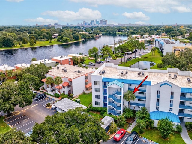 drone / aerial view with a water view