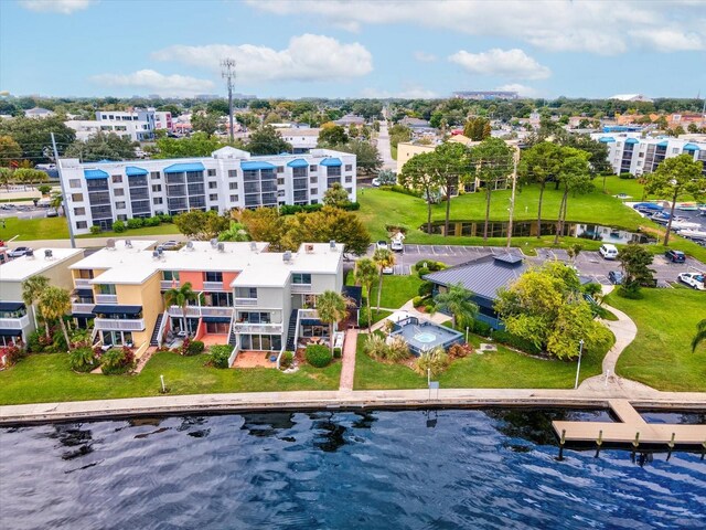 birds eye view of property featuring a water view