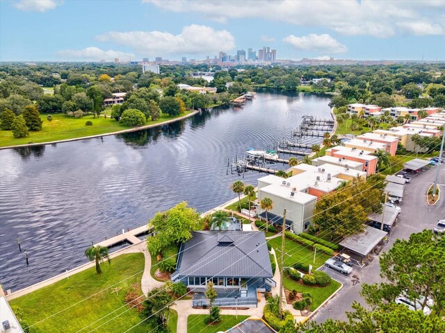 birds eye view of property featuring a water view