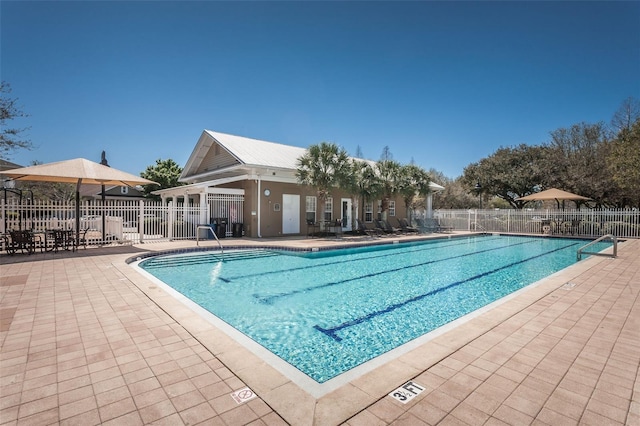 view of pool featuring a patio