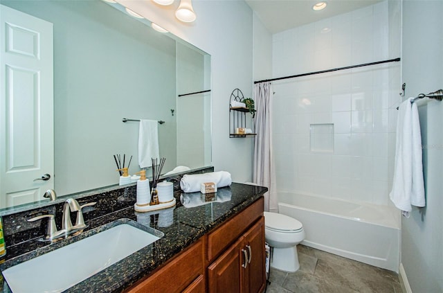 full bathroom with vanity, toilet, and shower / tub combo with curtain