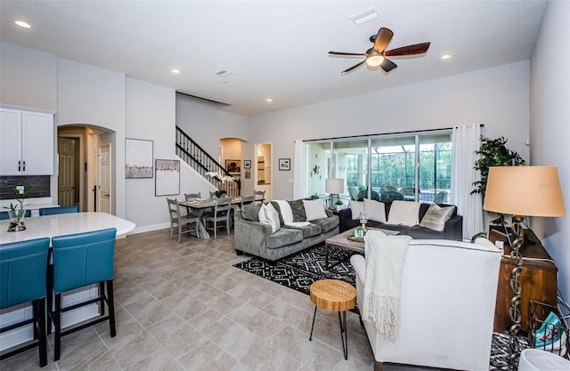 living room with ceiling fan