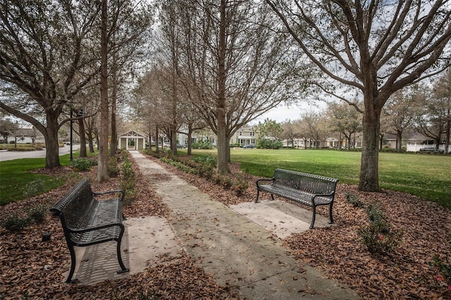 view of home's community featuring a yard