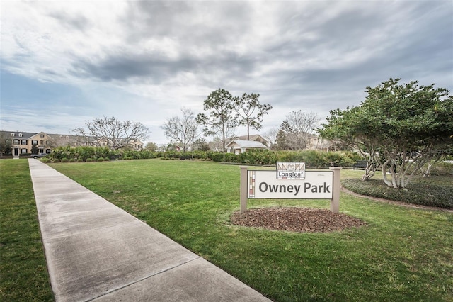 surrounding community with a lawn