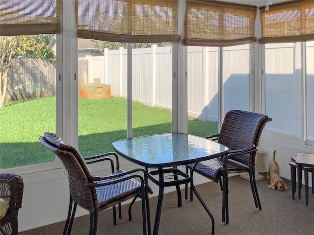 sunroom featuring a healthy amount of sunlight