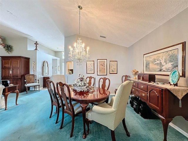 carpeted dining room with a textured ceiling, a chandelier, and vaulted ceiling