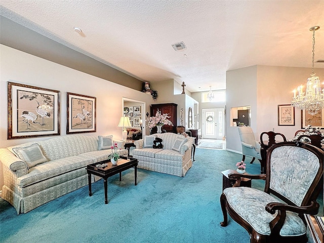 living room featuring an inviting chandelier, a textured ceiling, and carpet flooring