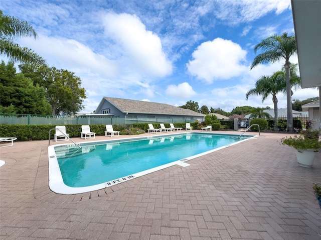 view of pool featuring a patio