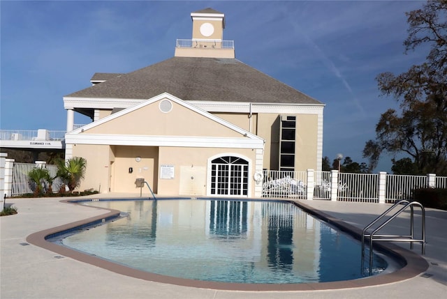 view of pool featuring a patio area