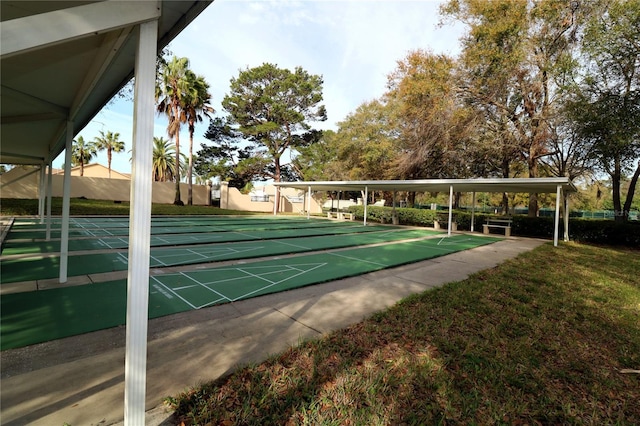 surrounding community featuring a lawn