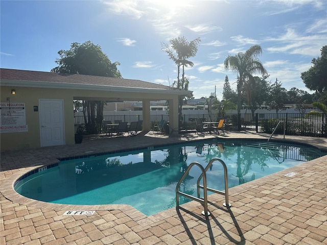 view of swimming pool featuring a patio area