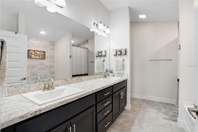 bathroom featuring tile patterned floors, separate shower and tub, and vanity