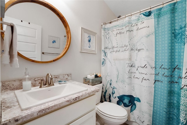 bathroom featuring a shower with curtain, vaulted ceiling, vanity, and toilet