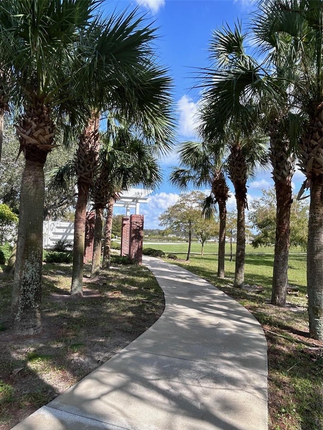 view of home's community featuring a yard