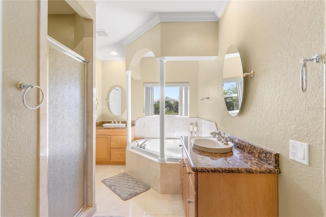 bathroom featuring vanity, ornate columns, crown molding, tile patterned flooring, and independent shower and bath