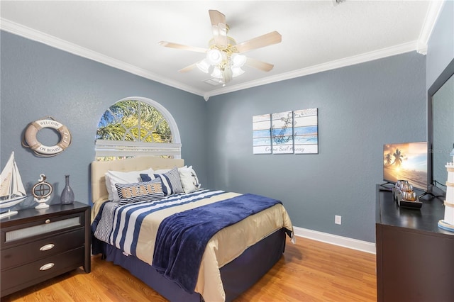 bedroom with ceiling fan, light hardwood / wood-style flooring, and crown molding