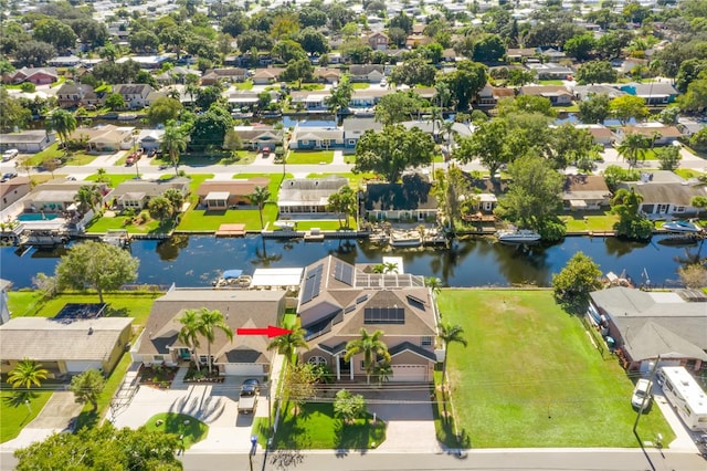 drone / aerial view with a water view