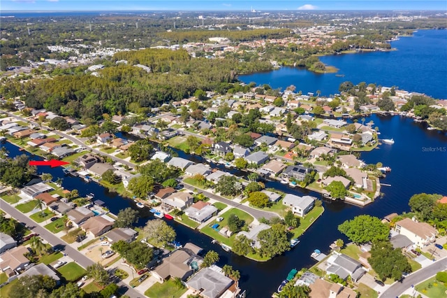 drone / aerial view with a water view