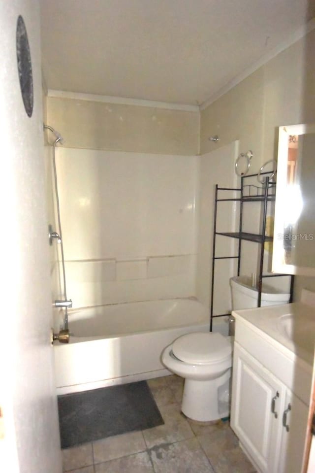 full bathroom featuring tile patterned flooring, shower / tub combination, ornamental molding, vanity, and toilet