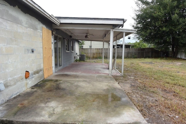 view of patio / terrace featuring ceiling fan and central air condition unit