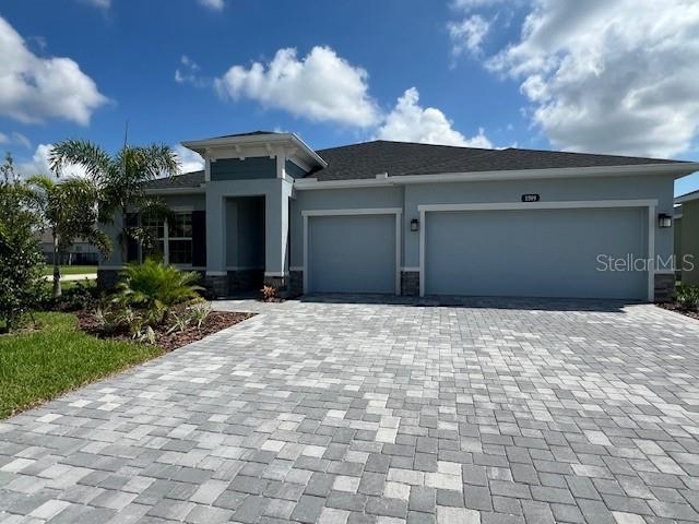 view of front of property with a garage