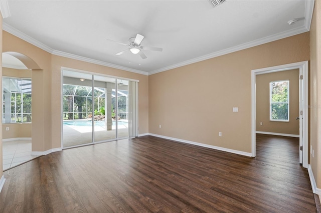 unfurnished room with crown molding, dark hardwood / wood-style flooring, and ceiling fan