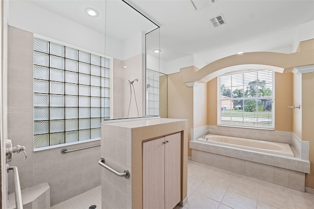 bathroom with vanity, separate shower and tub, ornate columns, and tile patterned flooring