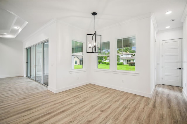 interior space with crown molding, a notable chandelier, and light wood-type flooring