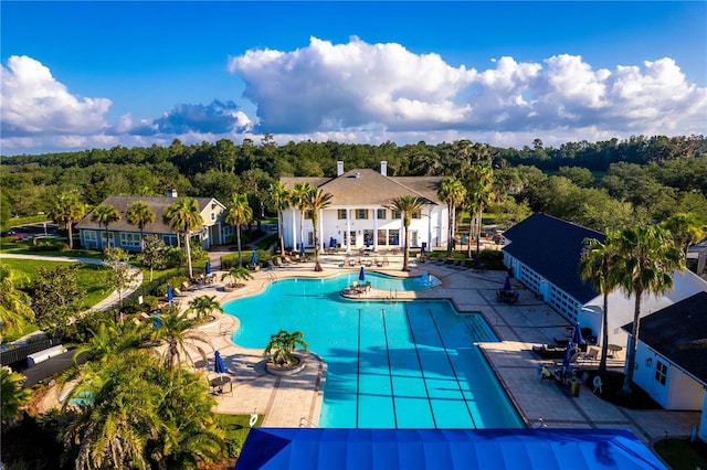 view of swimming pool featuring a patio