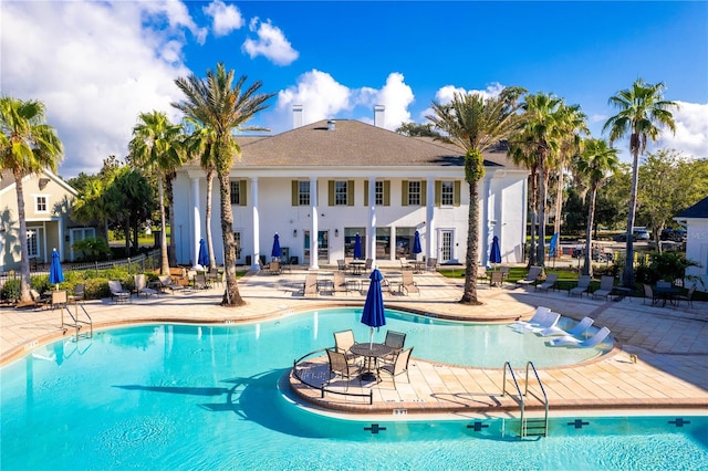 view of pool featuring a patio