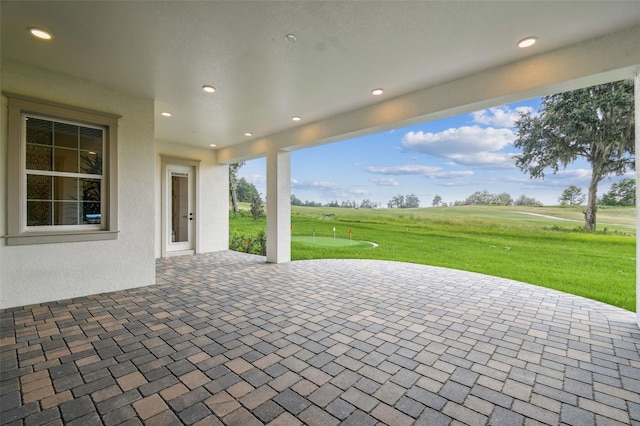 view of patio with a rural view