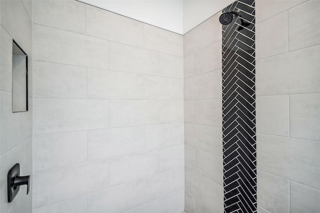 details with a tile shower