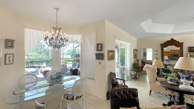 tiled dining room with a wealth of natural light and a chandelier