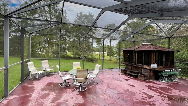 view of patio / terrace with glass enclosure