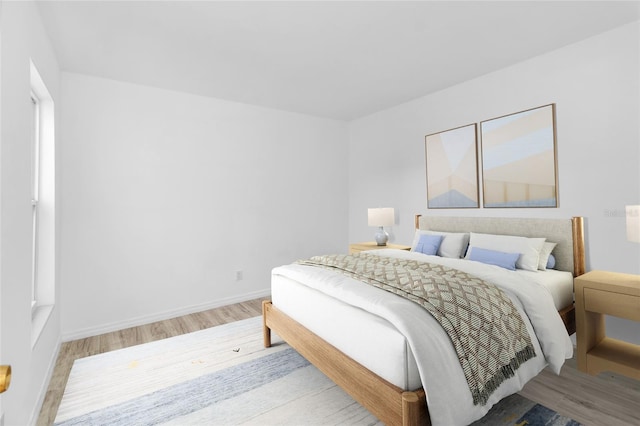 bedroom featuring light hardwood / wood-style floors